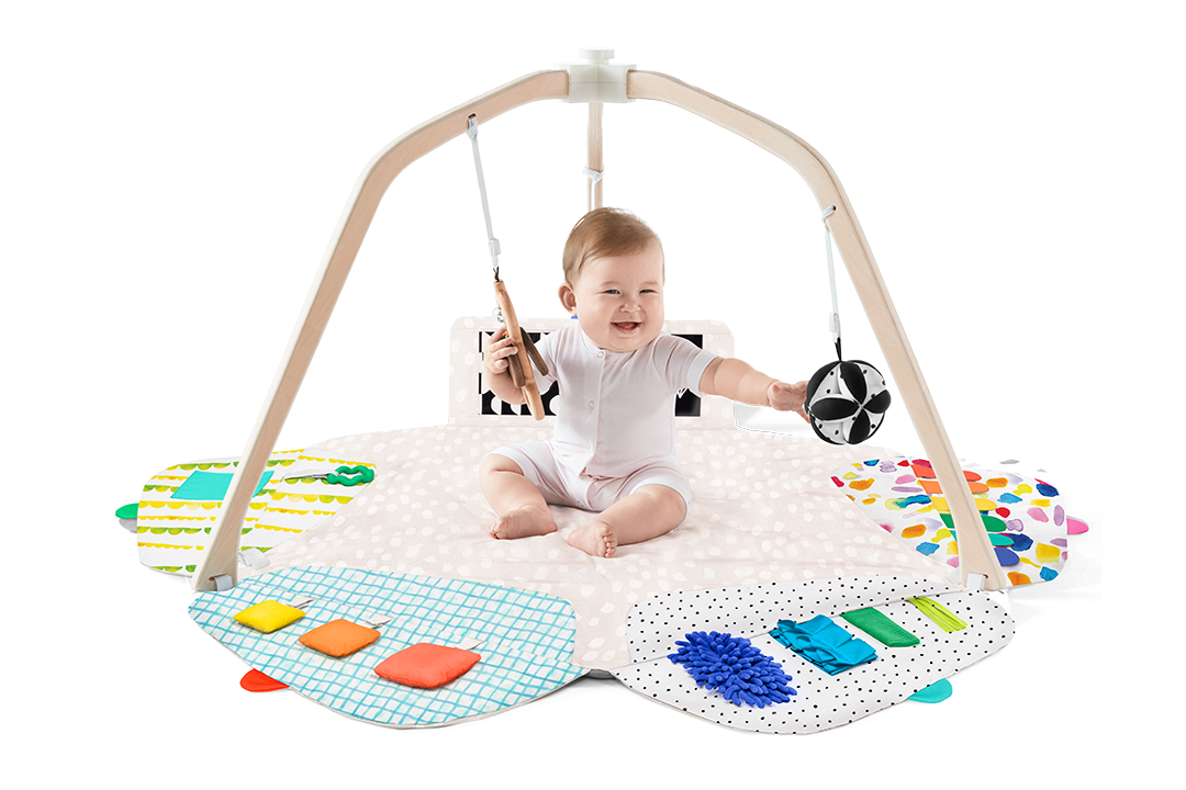 Baby sitting in The Play Gym by Lovevery